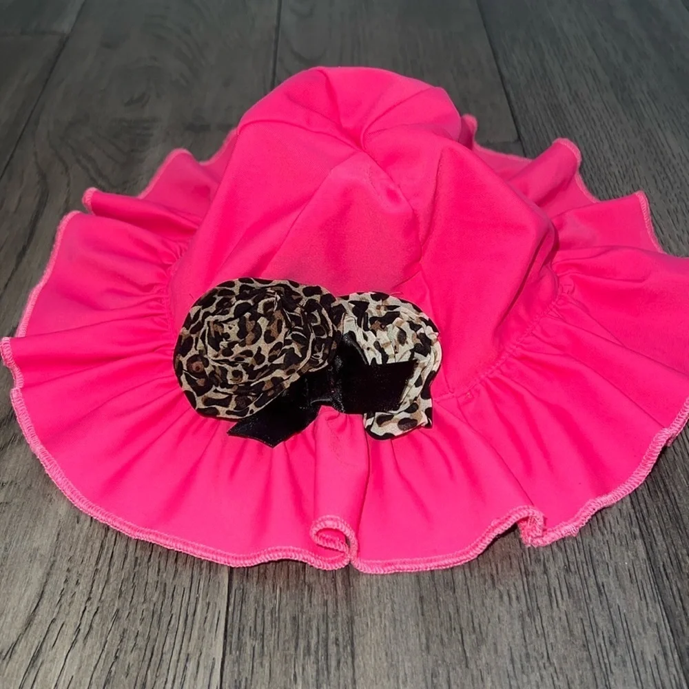 Baby swim hat with leopard like flowers and ruffle trim